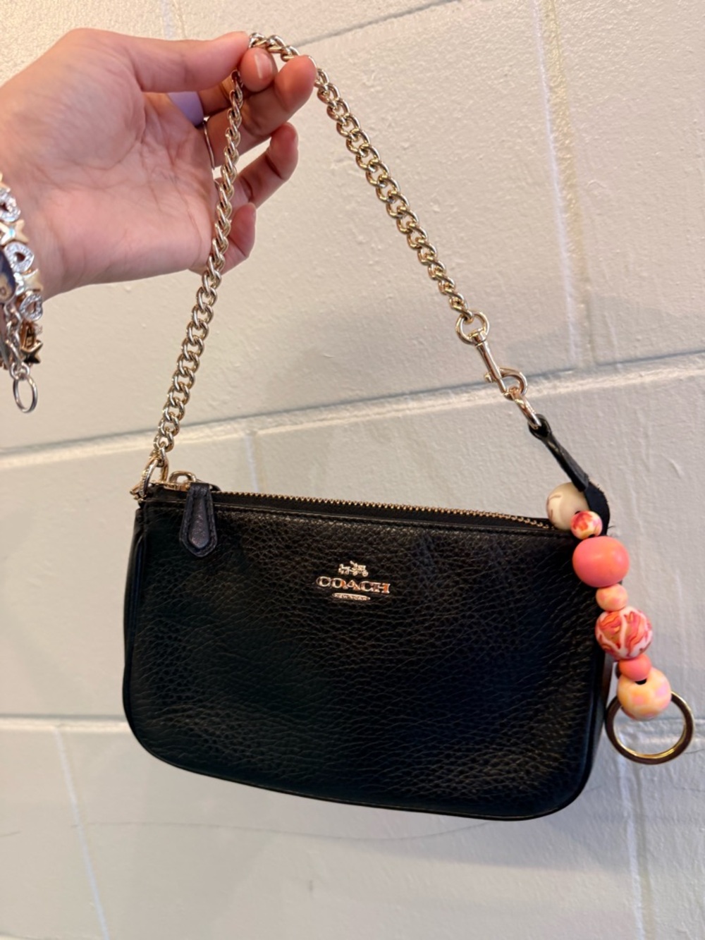 Coach Black Leather Shoulder Wristlet with Gold Chain and Pink Bead Charm
